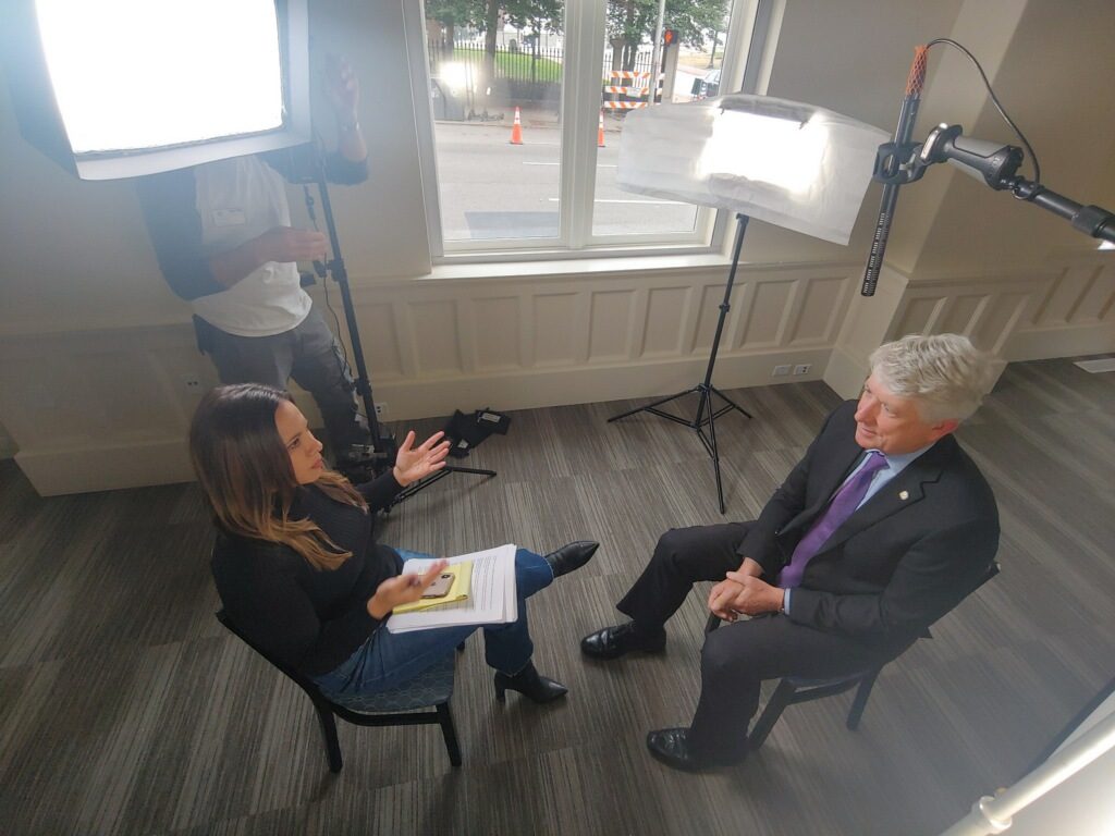 Jessica Jallings Gomez interviewing a subject on set